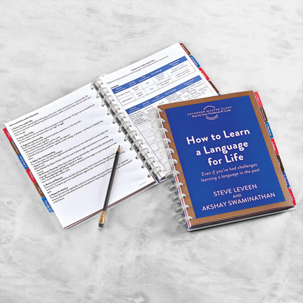 Image of book and notebook with pen.